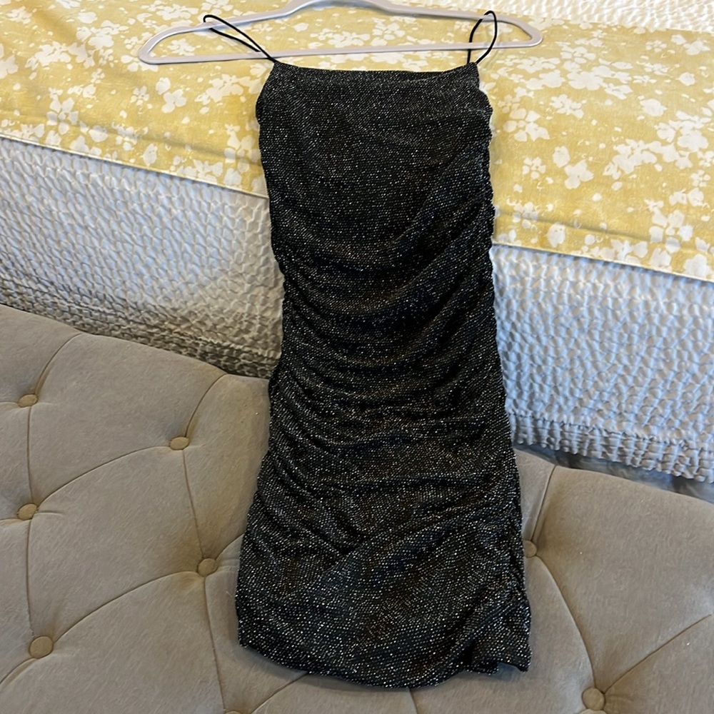 NWOT Princess Polly little blackk dress size 2. Stretch metallic & black fabric